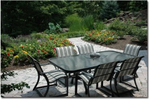 One of four places to eat breakfast, the rear patio under a rose arbor. One of four places to eat breakfast, the rear patio under a rose arbor.