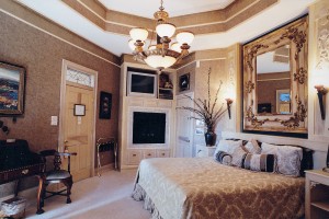 Spellbound- King Bed w/Pillow Top, Fireplace, HD Flat Screen TV w/ a DVD/VCR Player, and just out of view on the left is a desk